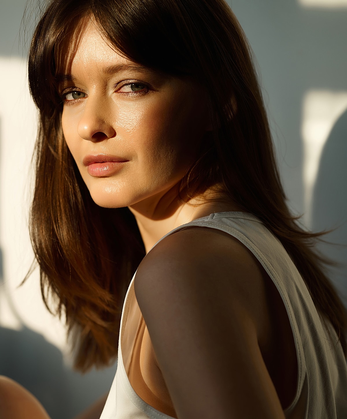 Close-up of a woman's face and smile.