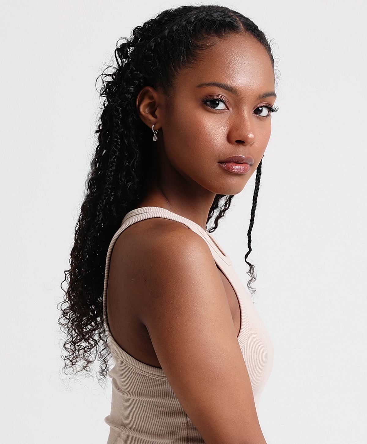 Close-up of a woman's face and smile.