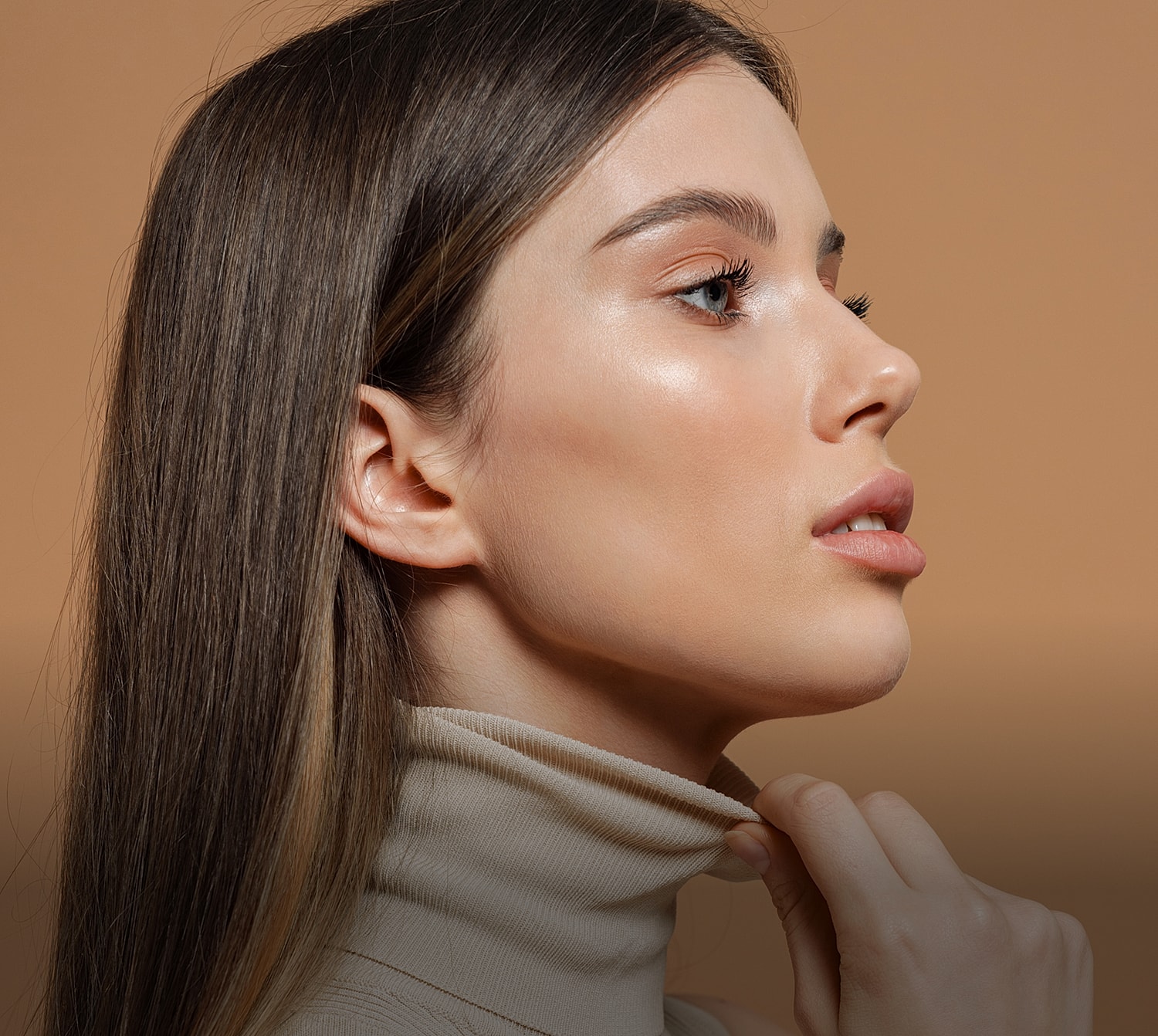 Profile of a woman with long hair.