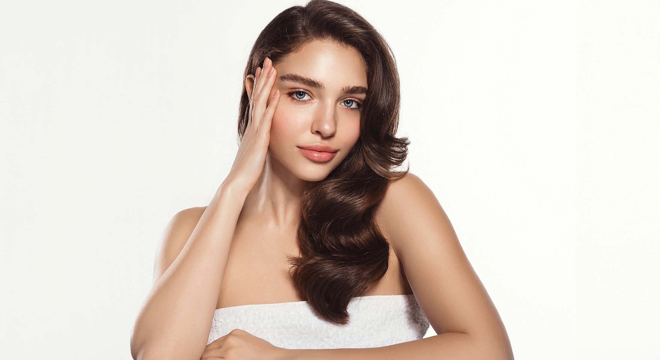 Woman with long hair posing gracefully.